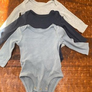Set of 3 waffle long sleeve onesies. Nave, gray, and light blue.